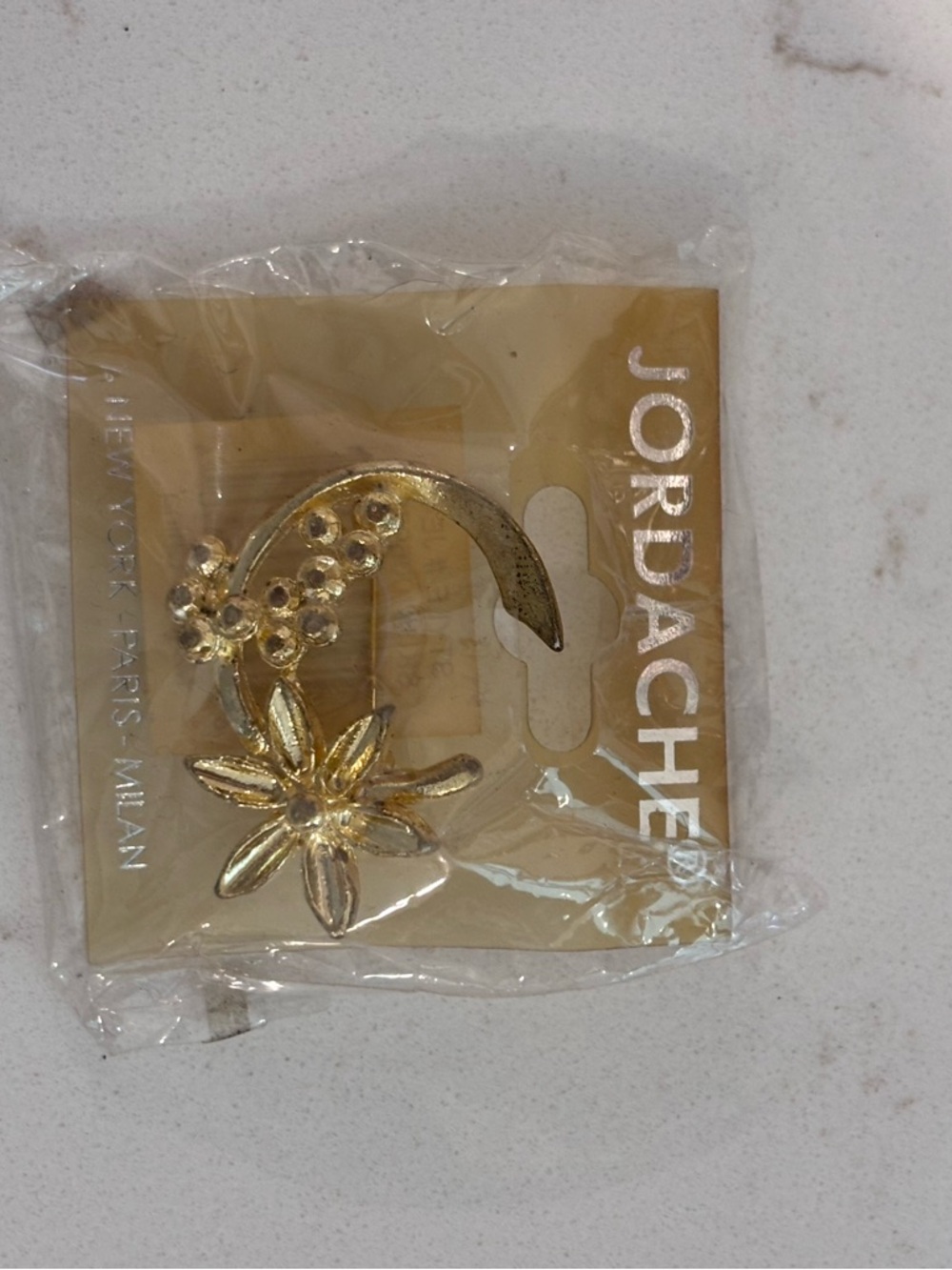 vintage Jordache gold-tone floral brooch pin.